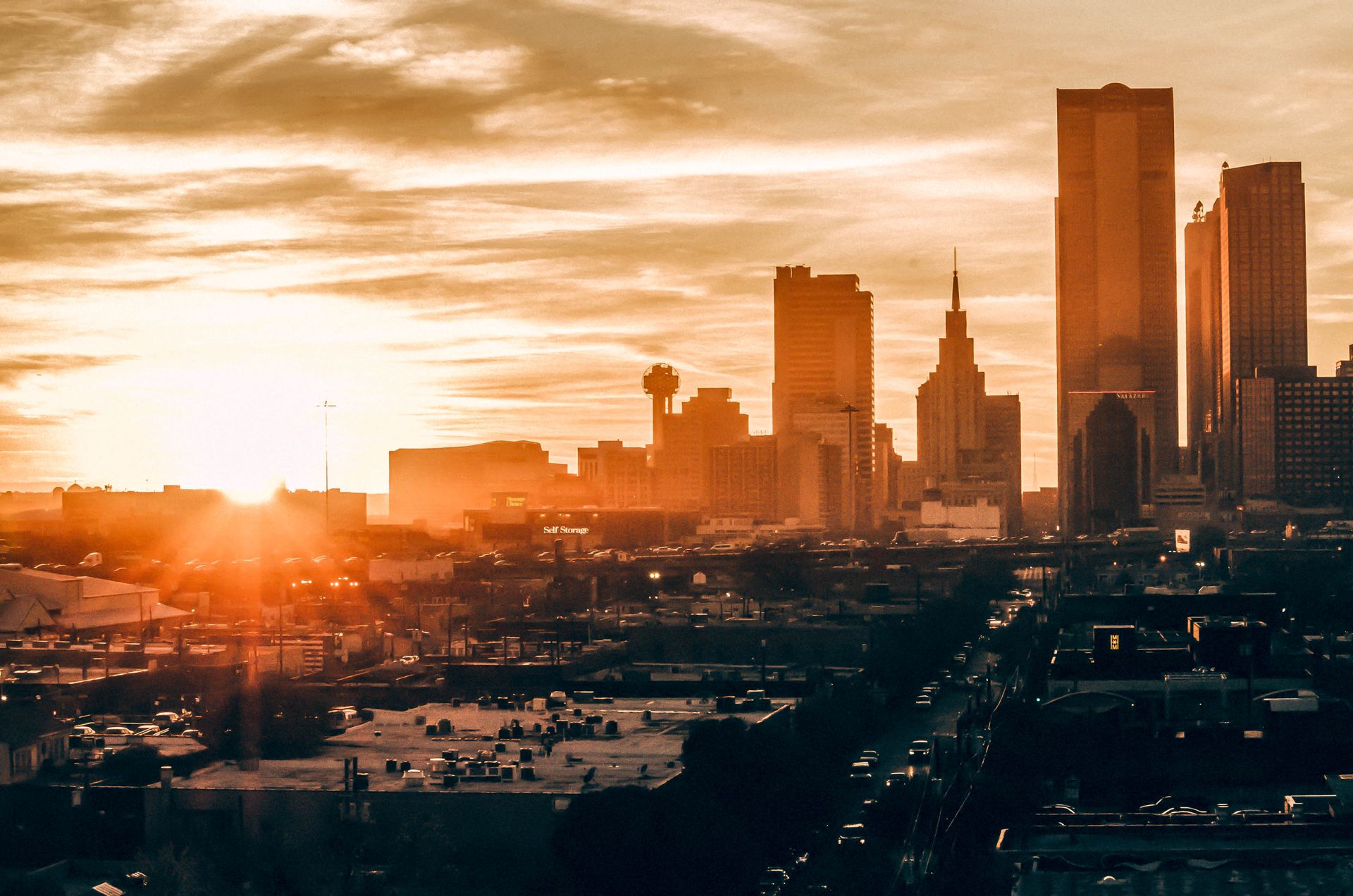 Dallas skyline silhouetted at golden hour